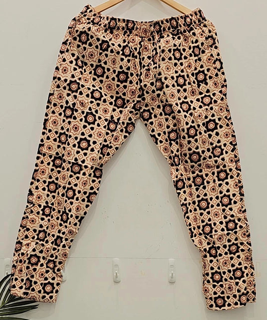 "Neutral Chic: Beige and Black Patterned Pants"