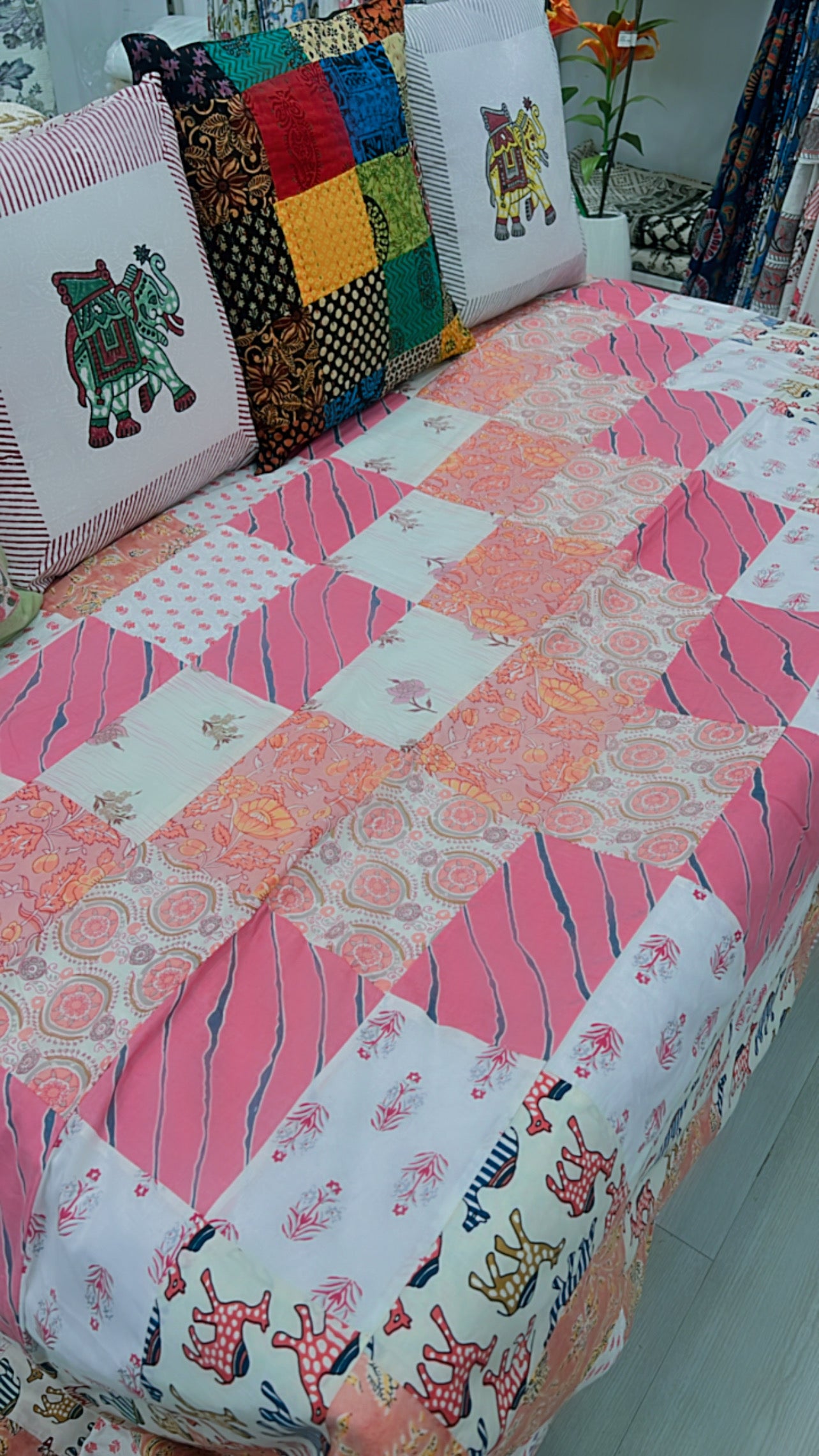 "Summer Blossoms: Pink Floral Patchwork Quilt"