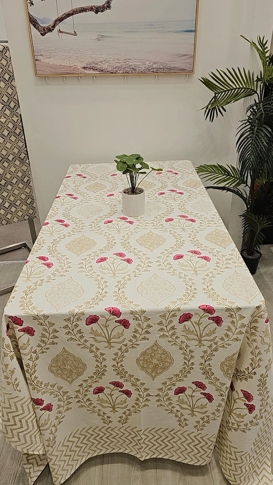 "Blushing Blooms: Beige Tablecloth with Pink Floral Patterns"