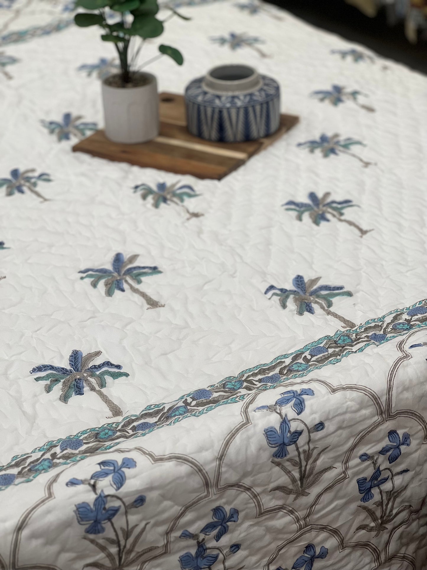 "Frosty Palms: A Serene White Winter Quilt with Tropical Elegance"