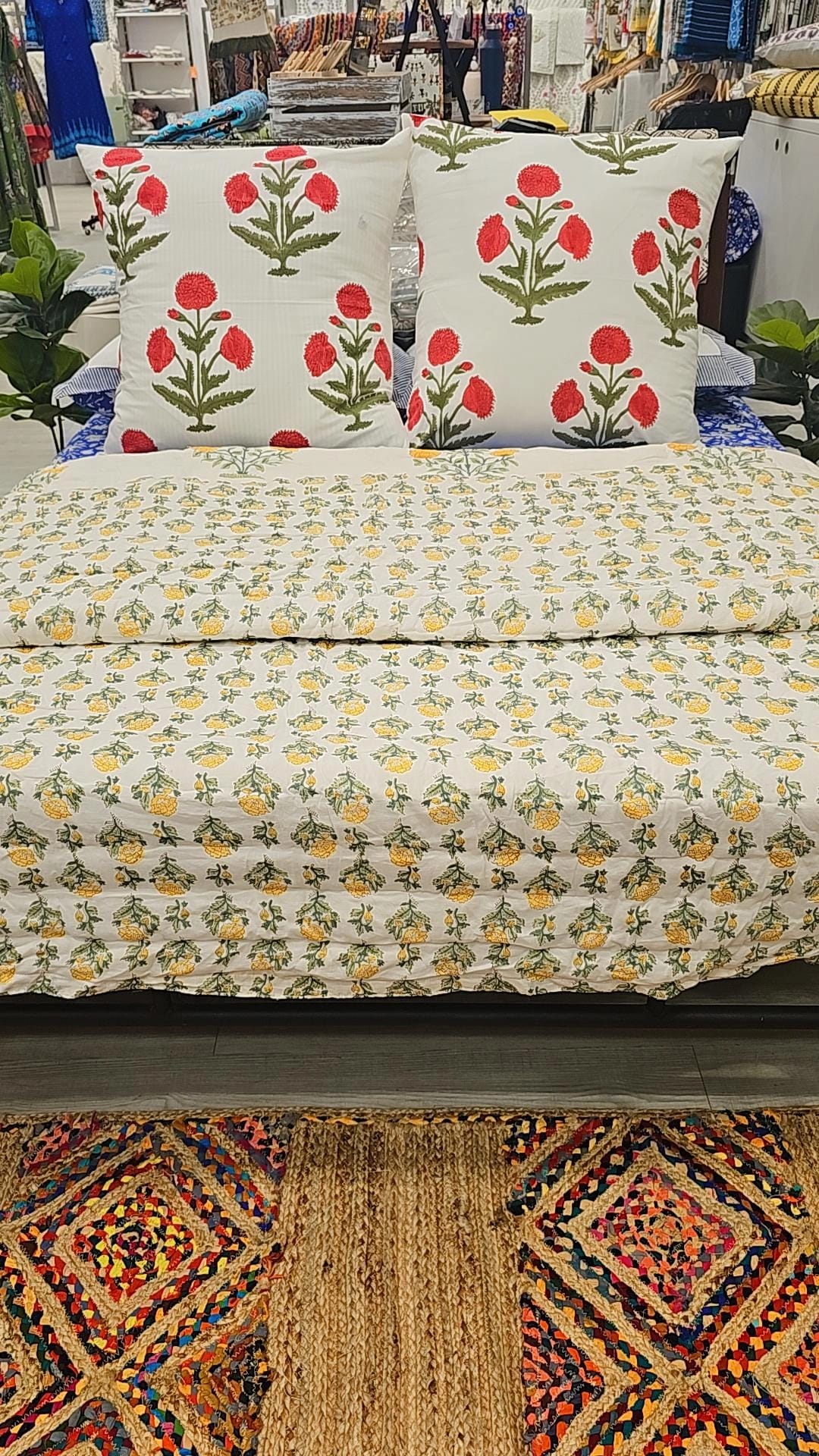 "Sunlit Petals: White Floral Quilt with Blooming Yellow Flowers"