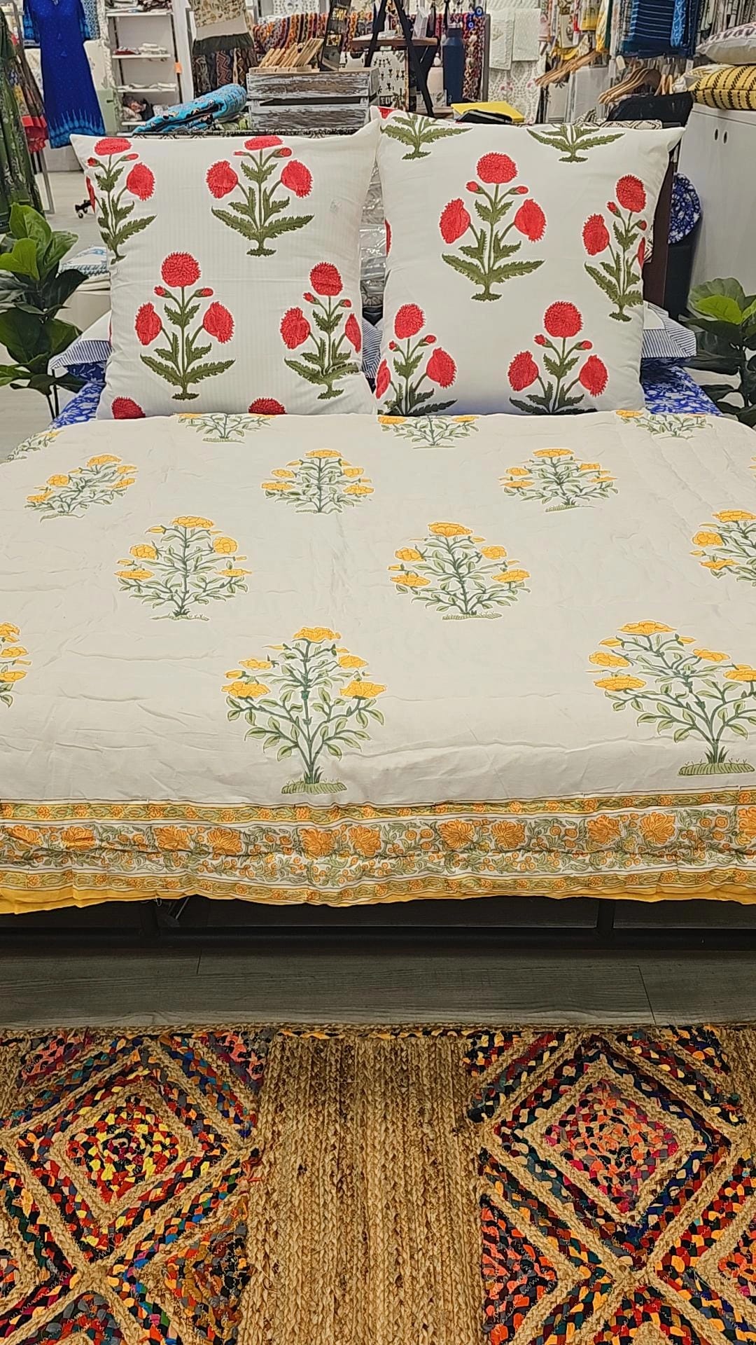 "Sunlit Petals: White Floral Quilt with Blooming Yellow Flowers"