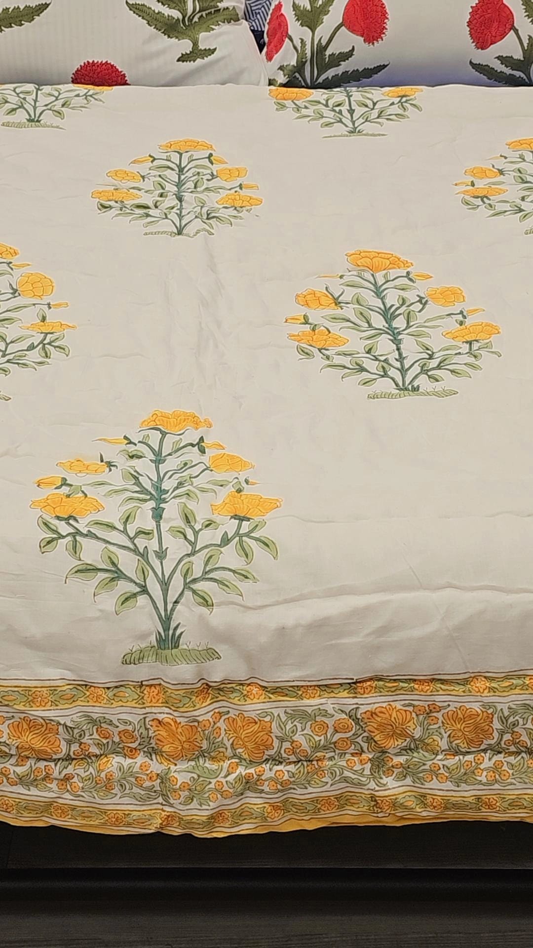 "Sunlit Petals: White Floral Quilt with Blooming Yellow Flowers"