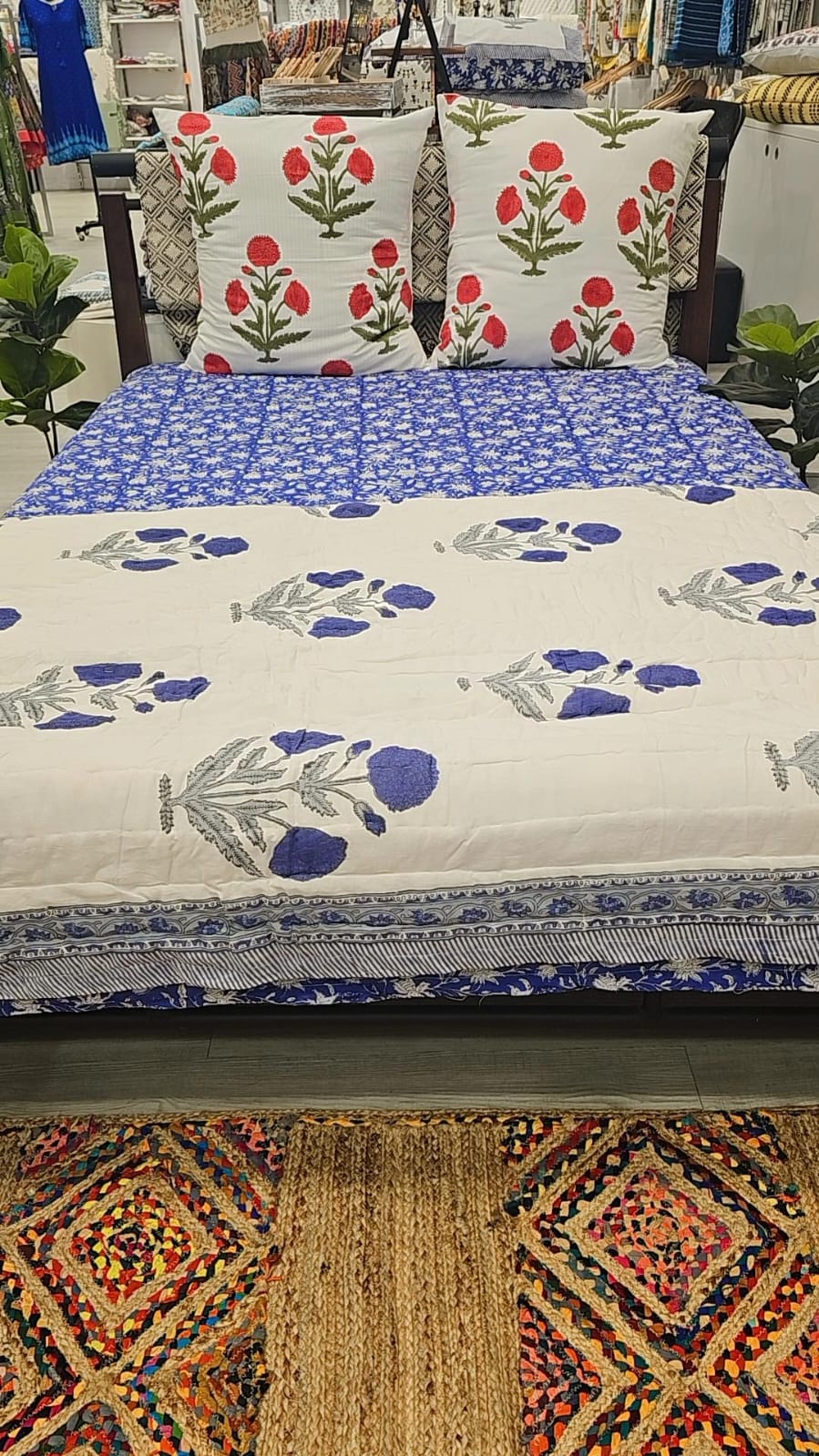 "Twilight Garden: Blue Floral Quilt with Reversible White Base"