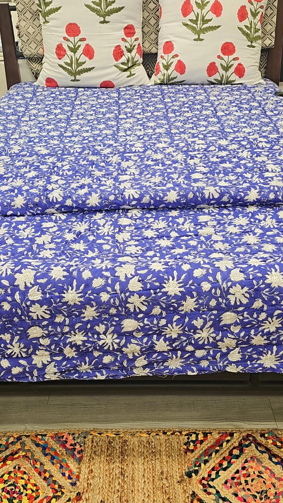 "Twilight Garden: Blue Floral Quilt with Reversible White Base"