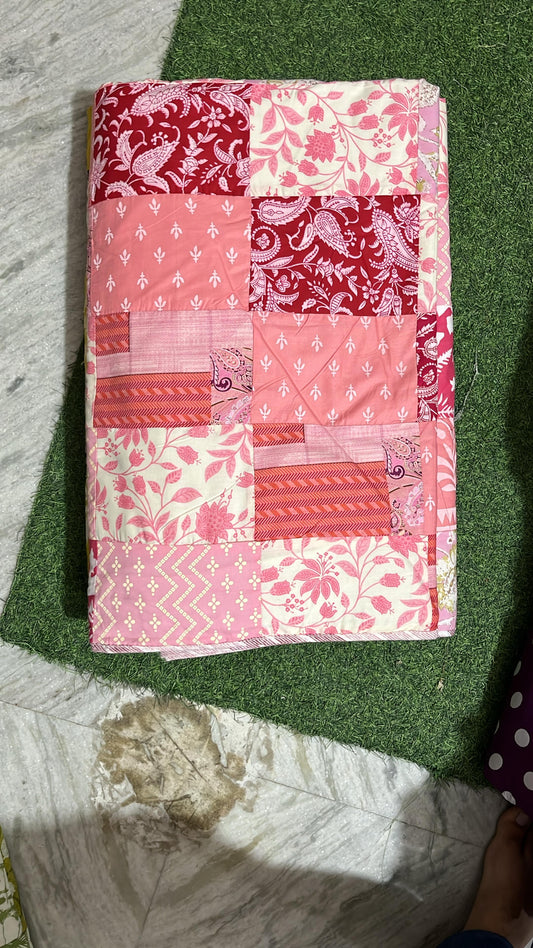 "Summer Blossoms: Pink Floral Patchwork Quilt"