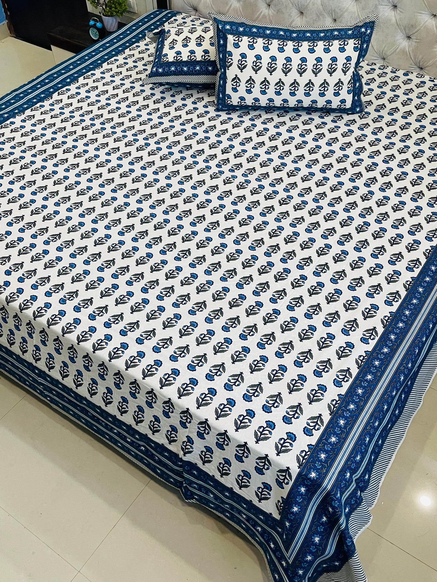 “Blue Whisper Motifs on Pure White”